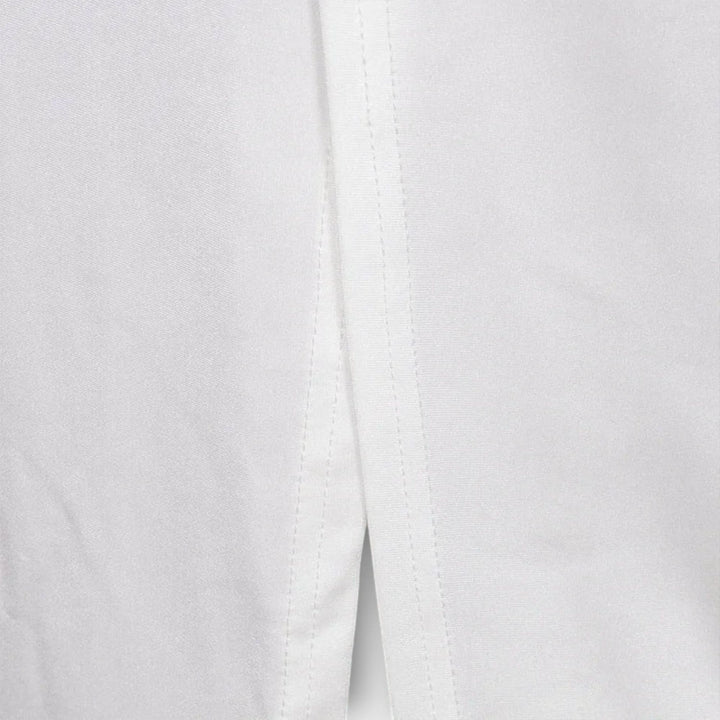 Selah - Bílé šaty s dlouhým rukávem a výřezem v pase s akcenty z kamínků