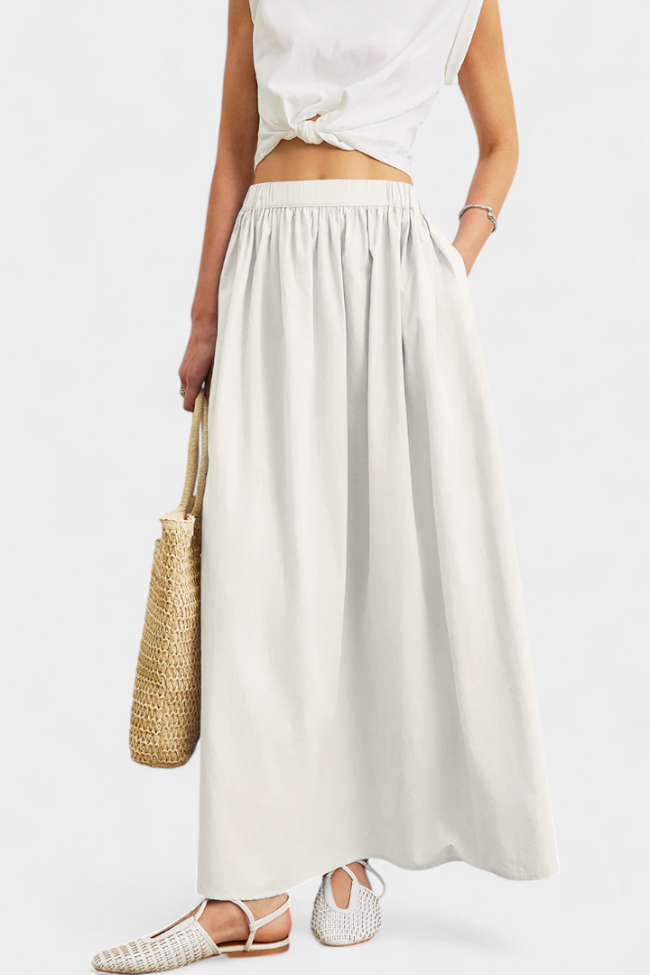 Yora | Bavlněná áčková sukně s elastickým pasem a kapsami